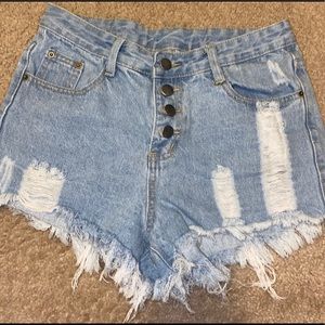Distressed ripped denim shorts
